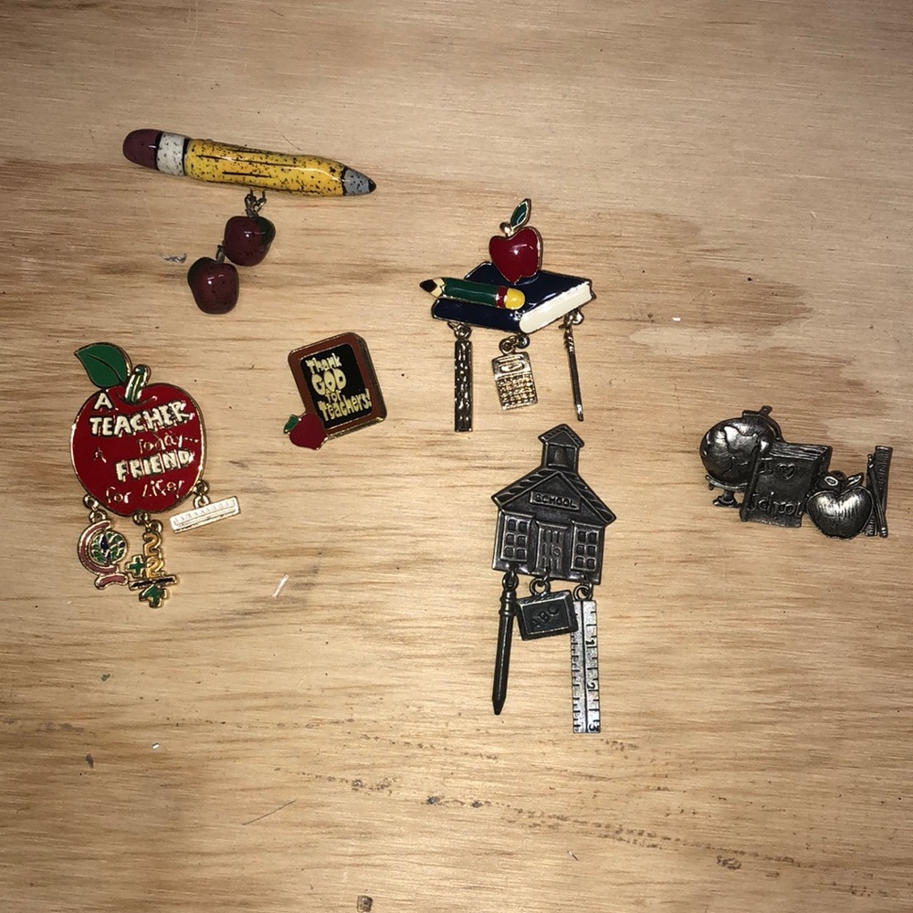 Six teacher pins/Brooches